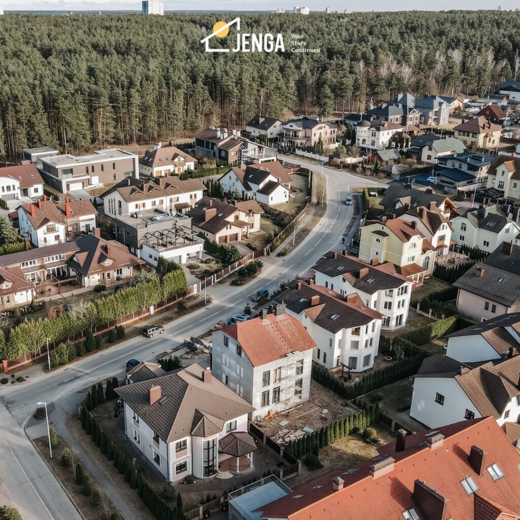 rows of homes along a curving road.