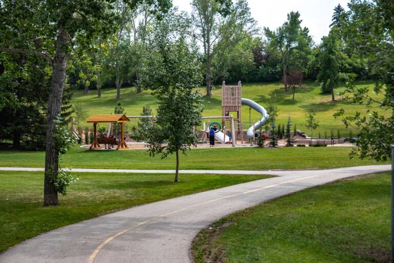 a public childrens park in a green space.